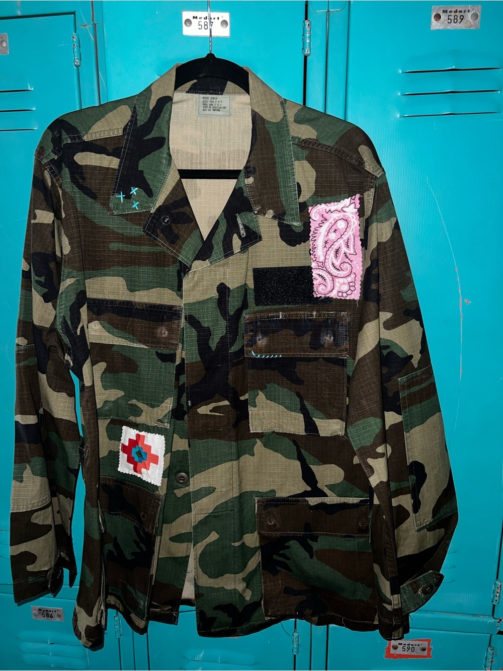 Repurposed Camouflage Military-Style Jacket with Patch Details